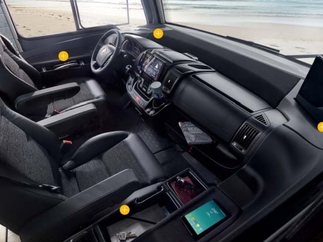 The spacious cockpit contains a host of gadgets - including a docking station for smartphones and tablets with inductive charging and USB so you can be sure you'll never miss a single Tweet.