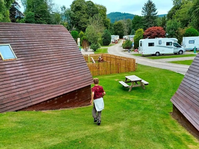 One of the newer additions to Pitchup.com’s portfolio, this quiet caravan park is situated close to the A9 in scenic Glen Glass, and half an hour’s drive from the popular dolphin-spotting lookout at Chanonry Point. A peaceful haven for families, couples and friends alike, kids will love the forest playground with its ‘Nessie’ homage while grown-ups can enjoy a meander around the nearby Loch. Described as “near perfection” and an “excellent base camp for exploring the Scottish Highlands”, 98% of reviewers said they would revisit. What’s more, the park has accessible facilities, hot showers, baby-changing amenities and a launderette, plus an onsite shop. The nearest pub is only a five-minute walk away, and lively Inverness a half-hour drive. Prices start at £37 per night for up to five adults, for a fully-serviced gravel touring pitch.