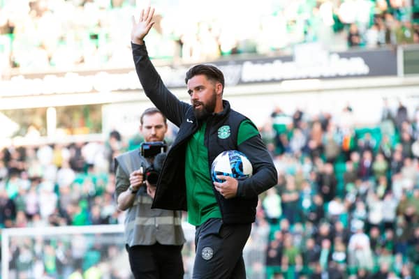 Darren McGregor takes the acclaim of the Hibs fans on the day that he announced he will be retiring at the end of the season.