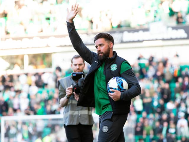 Darren McGregor takes the acclaim of the Hibs fans on the day that he announced he will be retiring at the end of the season.