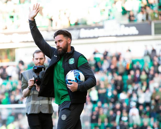 Darren McGregor takes the acclaim of the Hibs fans on the day that he announced he will be retiring at the end of the season.