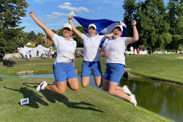 Chloe Goadby, Hannah Darling and Lorna McClymont jump with joy after securing Scotland's best finish in the Women's World Amateur Team Championship.