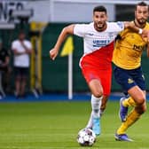Rangers' Antonio Colak and Union's Christian Burgess fight for the ball (Photo by LAURIE DIEFFEMBACQ/BELGA MAG/AFP via Getty Images)