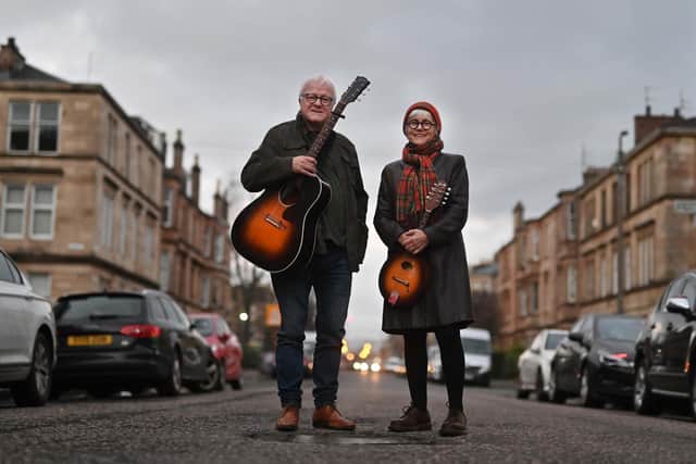 Rachel and Craig Smillie who are standing on the spot in Kenmure Street where on the morning of 13 May 2021,  two Sikh men of Indian origin were taken from their home and detained by the Home Office in a van on the street for alleged immigration violations. Picture: John Devlin/JPIMedia