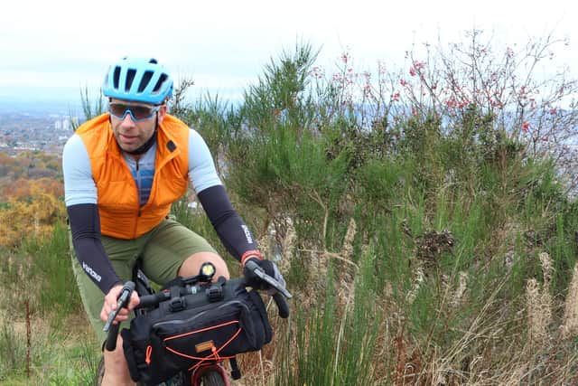 Mark Beaumont with the view across the city from Cathkin Braes Country Park. Picture: Markus Stitz