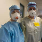 Doctors and nurses prepare to enter the Covid-19 ward putting on the PPE safety equipment at the Edinburgh Royal Infirmary. Picture: Andy O'Brien