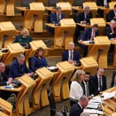 Finance Secretary Shona Robison unveils the 2024/25 Scottish budget. Image: Andrew Milligan/Press Association.