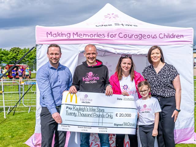Craig MacLean and Mel Harrison from McDonald’s with Jonathan and Anna Cordiner and daughter Emma. (Pic:Stuart Ross Media).