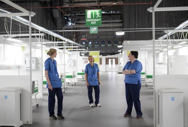 Nurses make final preparations during the completion of the construction of the NHS Louisa Jordan hospital. Picture: Jane Barlow/PA Wire