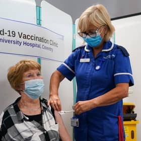 Margaret Keenan, the first person to receive a Covid vaccine in the UK, receives her booster jab at University Hospital Coventry, Warwickshire. Picture date: Friday September 24, 2021.