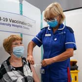 Margaret Keenan, the first person to receive a Covid vaccine in the UK, receives her booster jab at University Hospital Coventry, Warwickshire. Picture date: Friday September 24, 2021.