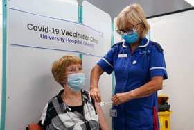 Margaret Keenan, the first person to receive a Covid vaccine in the UK, receives her booster jab at University Hospital Coventry, Warwickshire. Picture date: Friday September 24, 2021.