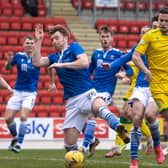 Hibs' Paul McGinn and St Johnstone's Liam Craig in action during Saturday's league match at McDiarmid Park. Photo by Alan Harvey / SNS Group