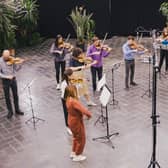 Members of Thirteen North in rehearsal