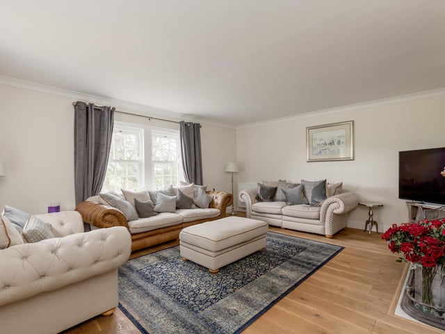 The cottage’s rooms have been kept a minimalist white, with colour provided by accessories. Some features that were not in keeping have been replaced, such as the old fireplaces.