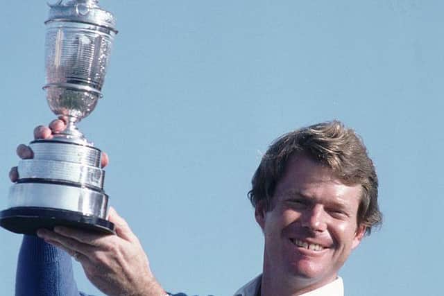 Tom Watson holds the Claret Jug aloft after winning the 1982 Open at Royal Troon. Picture: Bob Martin /Allsport