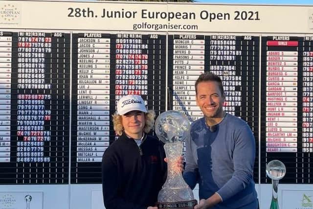 Blaiegowrie's Connor Graham receives the European Junior Open trophy from Sky Sports golf presenter Nick Dougherty.