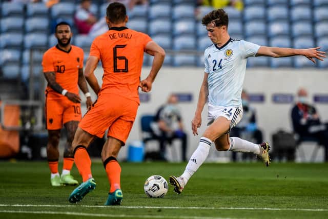 Scotland's defender Jack Hendry kicks the ball and scores during the international friendly match between Netherlands and Scotland. (Photo by PATRICIA DE MELO MOREIRA/AFP via Getty Images)