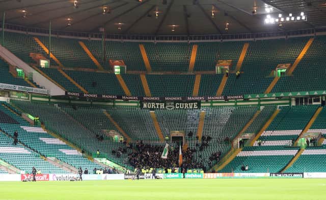 Members of the Green Brigade get the chills with a sit in protest against the reported appointment of Bernard Higgins following Celtic's 2-1 win over Aberdeen. (Photo by Craig Williamson / SNS Group)