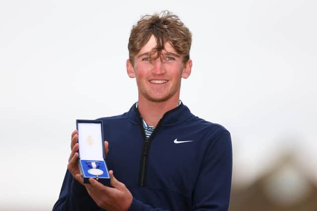 Calum Scott shows off the Silver Medal after finishing as the leading amateur in the 152nd Open at Royal Troon. Picture: Andrew Redington/Getty Images.