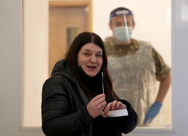 Councillor Susan Aitken, Leader of Glasgow City Council takes a Covid-19 asymptomatic test at a community hall at the Central Mosque in Glasgow.