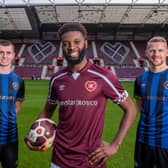From left, Cammy Devlin, Beni Baningime and Stephen Kingsley wear the Succession-inspired shirts. Pic: Sandy Young/scottishphotographer.com