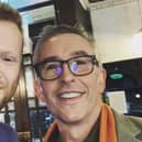 Coogan with a staff member in Jeremiah’s Taproom Pub In Edinburgh