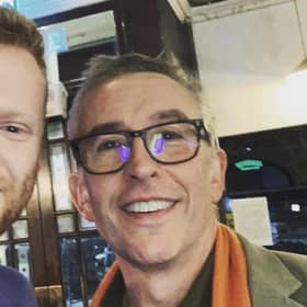 Coogan with a staff member in Jeremiah’s Taproom Pub In Edinburgh