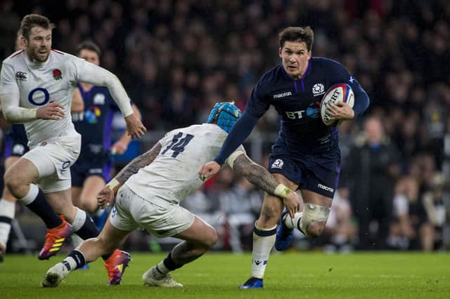 Sam Johnson goes through the England backline during a Six Nations match at Twickenham in 2019.