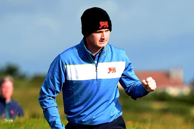Sandy Scott of GB & Ireland celebrates holing a putt during day the 2019 Walker Cup at Royal Liverpool. Picture: Richard Martin-Roberts/R&A/R&A via Getty Images.