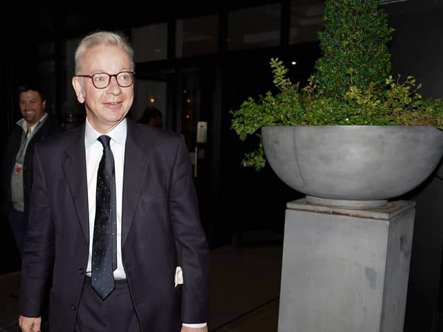 Michael Gove MP leaves hotel on the first day of the Conservative Party Conference