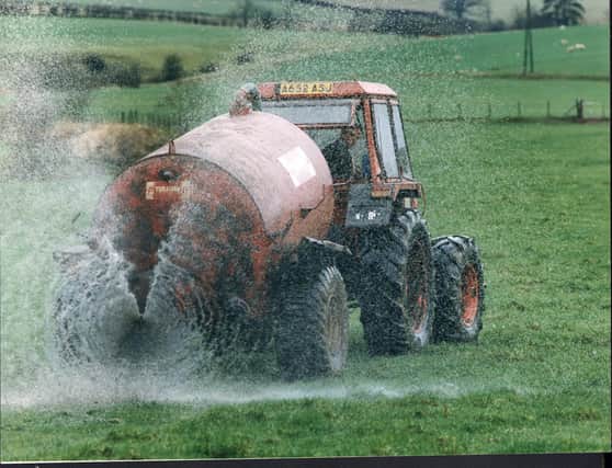 John Murdoch of Friendlesshead Farm, Mauchline spraying his field with slurry