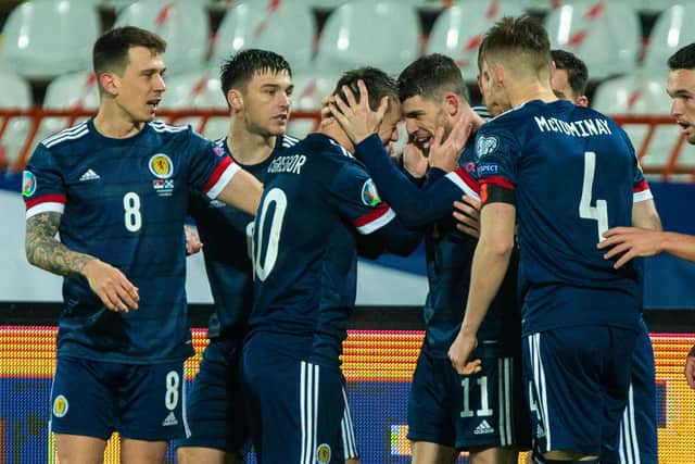 Ryan Christie is congratulated by his Scotland team-mates after netting the goal against Serbia in November that proved central to the counrtry ending a 23-year wait for a major finals appearance (Photo by Nikola Krstic / SNS Group)