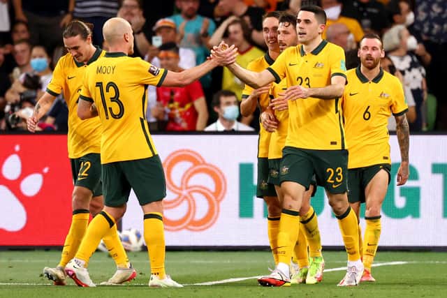 Australia celebrate Tom Rogic's goal against Vietnam.
