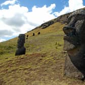 Some of the 390 statues, or moais in the Rapa Nui language, on the hillside of the Rano Raraku volcano in Easter Island (Picture: Martin Bernetti/AFP via Getty Images)