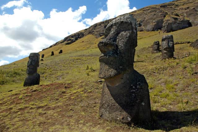 Some of the 390 statues, or moais in the Rapa Nui language, on the hillside of the Rano Raraku volcano in Easter Island (Picture: Martin Bernetti/AFP via Getty Images)