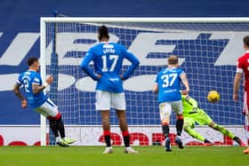 GLASGOW, SCOTLAND - NOVEMBER 22: Rangers' James Tavernier (L) makes it 4-0 with a penalty during a Scottish Premiership match between Rangers and Aberdeen at Ibrox Stadium, on November 22, 2020, in Glasgow, Scotland (Photo by Craig Foy / SNS Group)