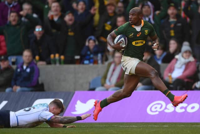Makazole Mapimpi hot-steps it on his way to scoring South Africa's first try against Scotland. (Photo by Stu Forster/Getty Images)