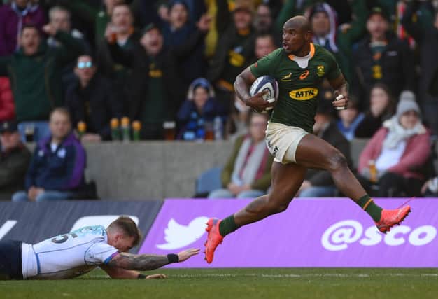 Makazole Mapimpi hot-steps it on his way to scoring South Africa's first try against Scotland. (Photo by Stu Forster/Getty Images)