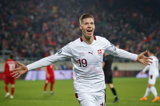 Cedric Itten, pictured scoring on his debut for Switzerland last November, has joined Rangers (Photo by STEFAN WERMUTH / AFP) (Photo by STEFAN WERMUTH/AFP via Getty Images)
