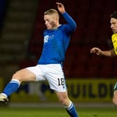 Cammy MacPherson in action for St. Johnstone during a cinch Premiership match against Hibs.