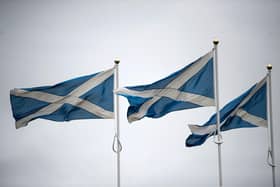 PwC has told more than 1,00 employees across their three offices in Scotland that they can spend around half their working hours at home and end work early on summer Fridays. Picture: Oli Scarff/AFP via Getty Images.