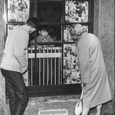 A young victim of Aberdeen's typhoid epidemic speaks to his granny through a hospital window. PIC: Aberdeen Journals.