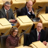 Kate Forbes (left) and John Swinney (right) attend the motion of no confidence vote in the Scottish Government on Wednesday. Picture: Getty Images