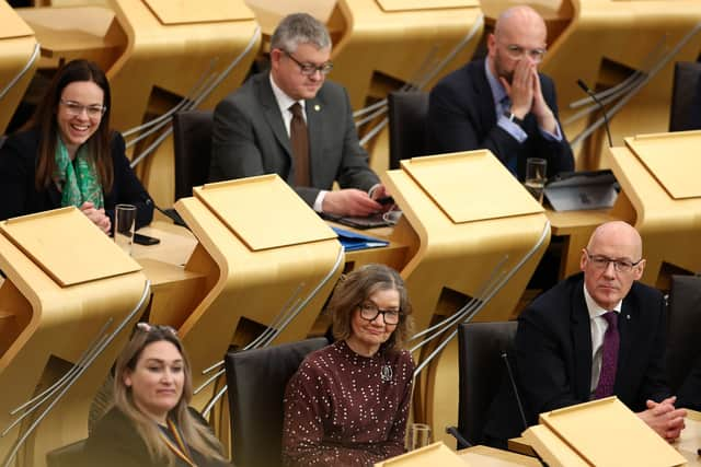 Kate Forbes (left) and John Swinney (right) attend the motion of no confidence vote in the Scottish Government on Wednesday. Picture: Getty Images