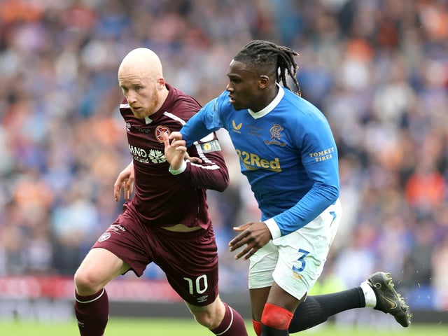 Hearts' Liam Boyce (left) and Rangers' Calvin Bassey battle for the ball during the Scottish Cup final at Hampden Park.
