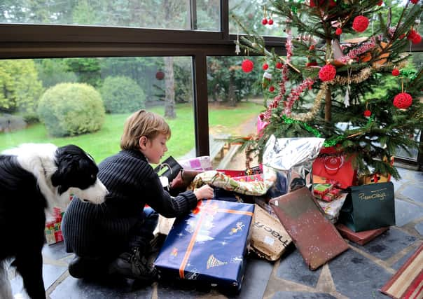 Christmas is about the people, not the presents (Picture: Philippe Huguen/AFP via Getty Images)