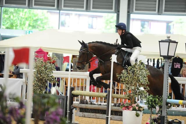 (Credit - Majestic Photography) - Sam Grindal competing in the Junior 90cm Championship Class