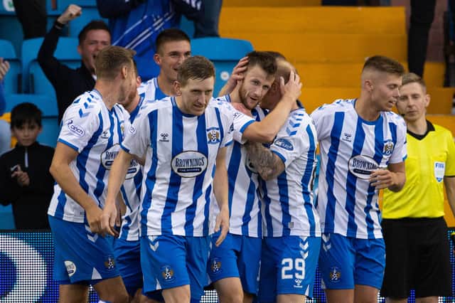 Liam Polworth (centre) celebrates after scoring Kilmarnock's opener in the 2-0 win over Ayr United. (Photo by Alan Harvey / SNS Group)