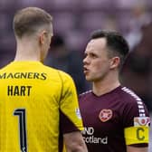 Celtic's Joe Hart and Hearts' Lawrence Shankland exchange words.